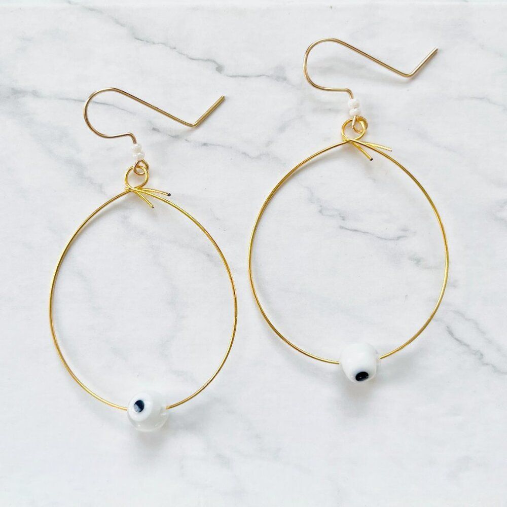 Gold Wire Tear Drop Earrings with White Evil Eye Glass Bead